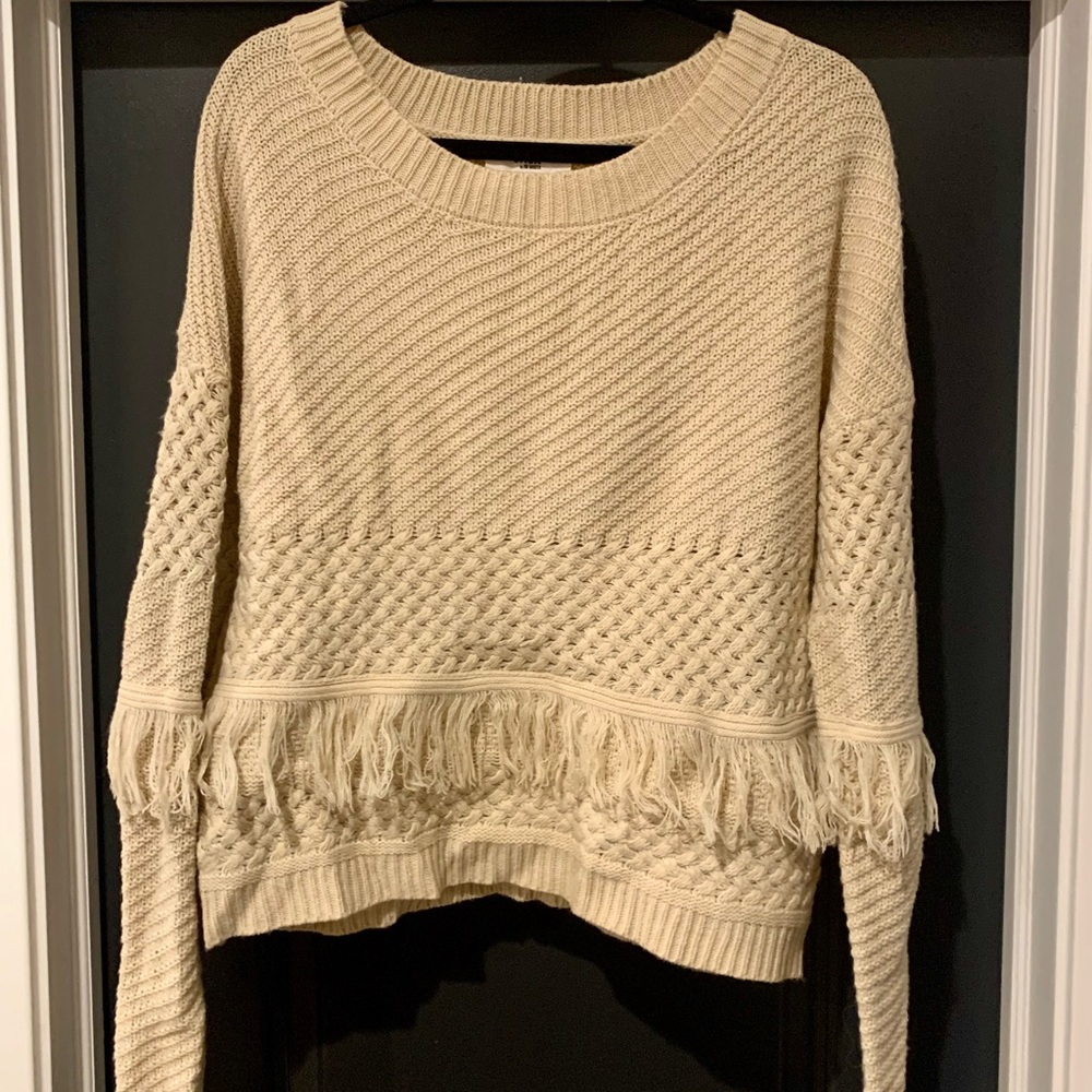 Cozy Cream Sweater with Fringe
